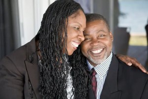 happy couple pairs graduates